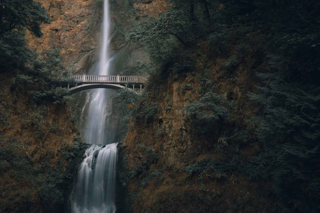 Beautiful bridge over a waterfall